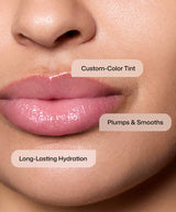 Close-up of glossy hydrated lips showing Custom-Color Tint, Plumps & Smooths, Long-Lasting Hydration